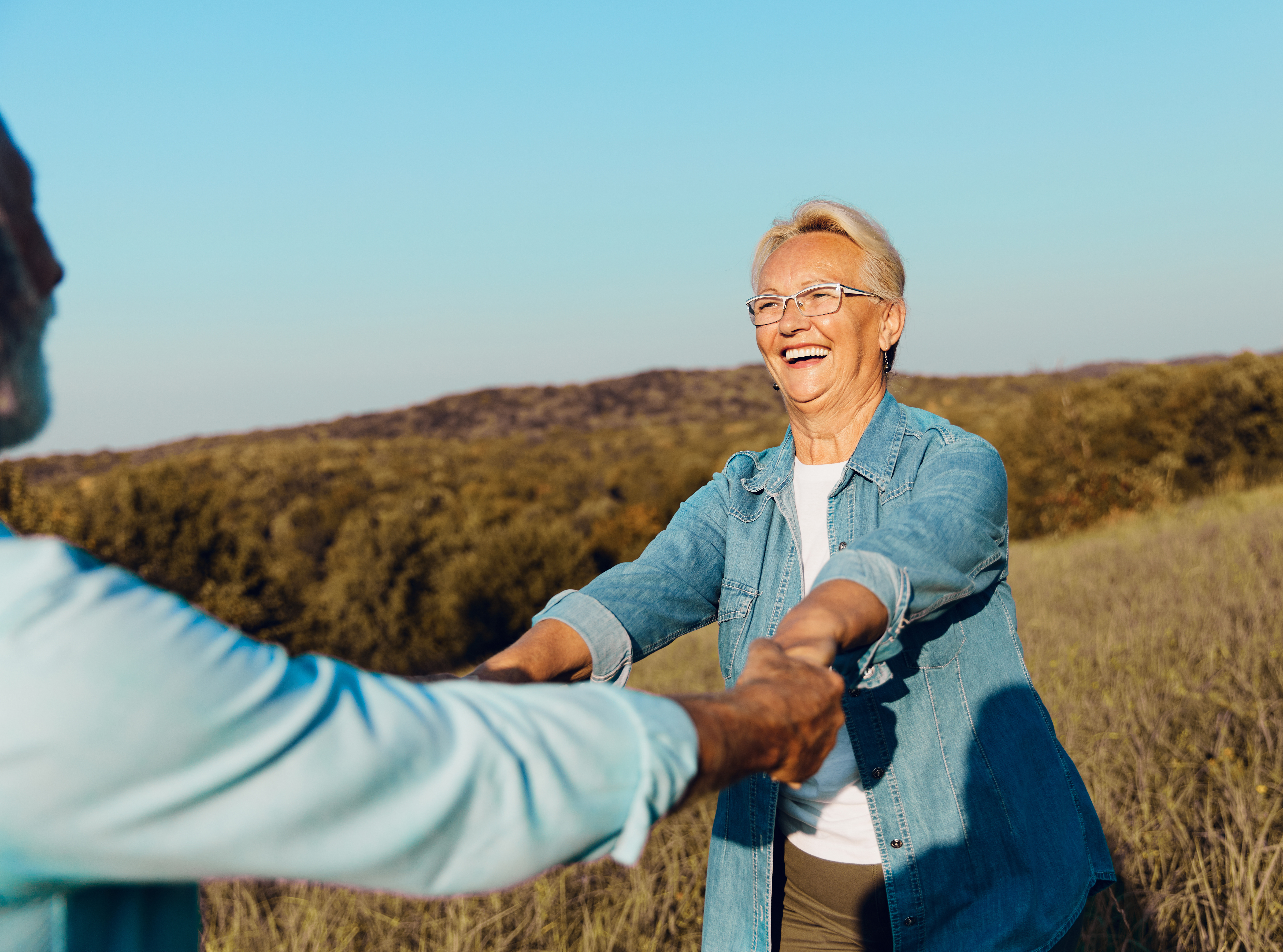 A couple enjoying life outdoors , free and protected